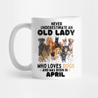Never Underestimate An Old Lady Who Loves Dogs And Was April Mug